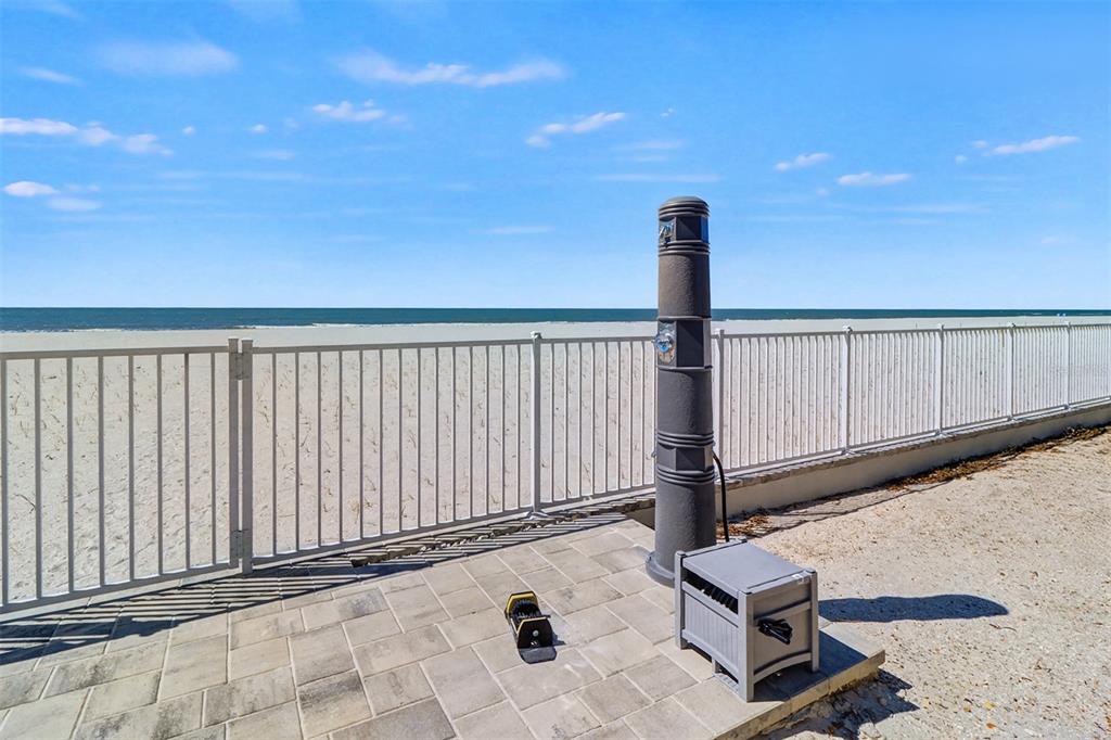 17400 Gulf Boulevard, Unit H2 Redington Shores, FL 33708 - Photo 30 of 36 a view of a patio with a table and chairs