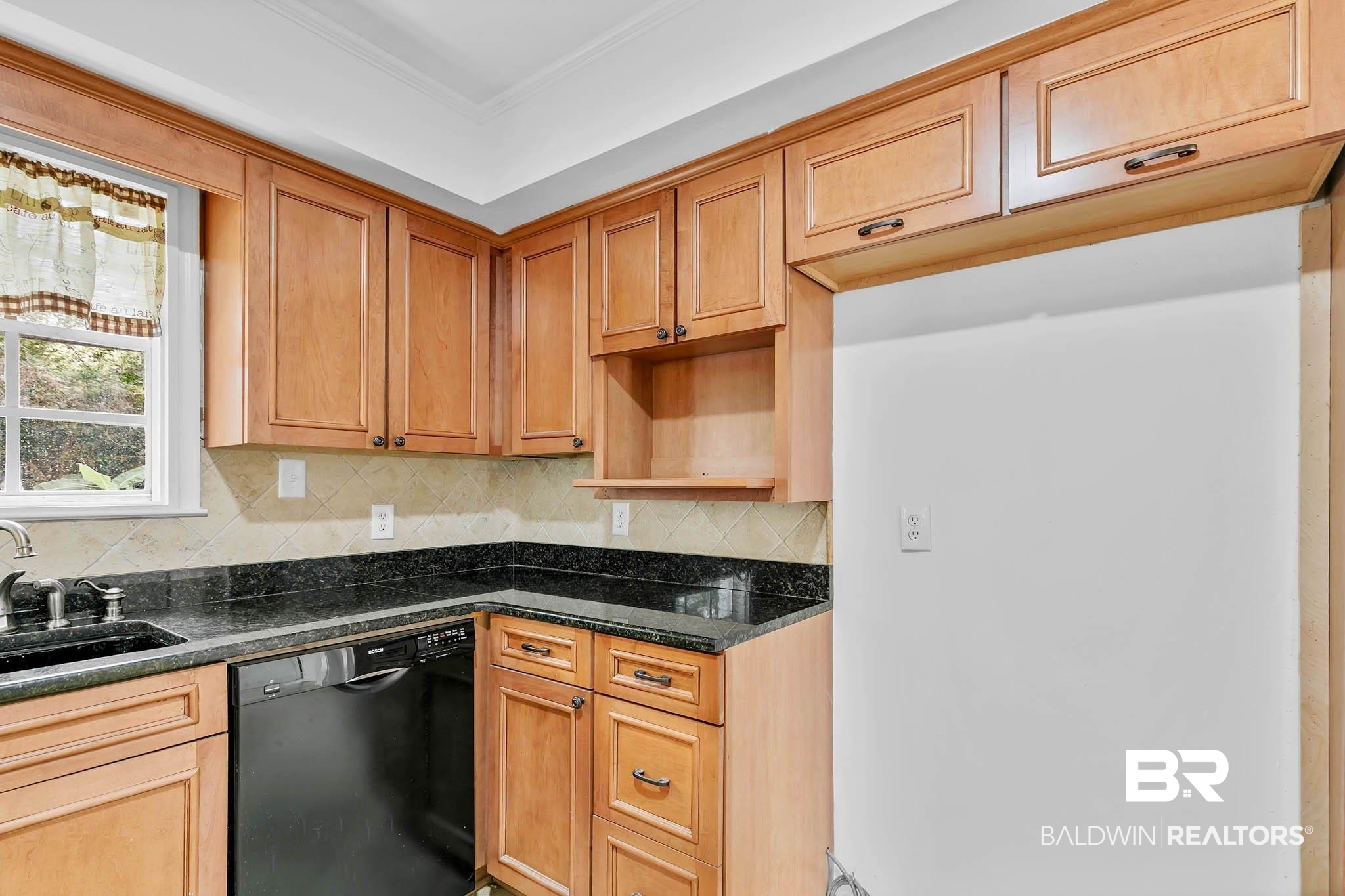 4705 Sherry Court Mobile, AL 36693 - Photo 22 of 100 Kitchen with dishwasher, tasteful backsplash, and dark stone counters