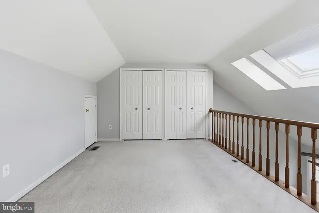 a view of a hallway with staircase