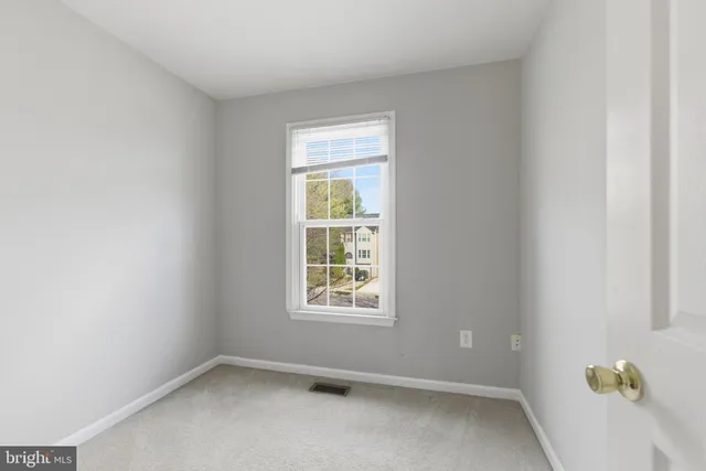 wooden floor and closet in a room