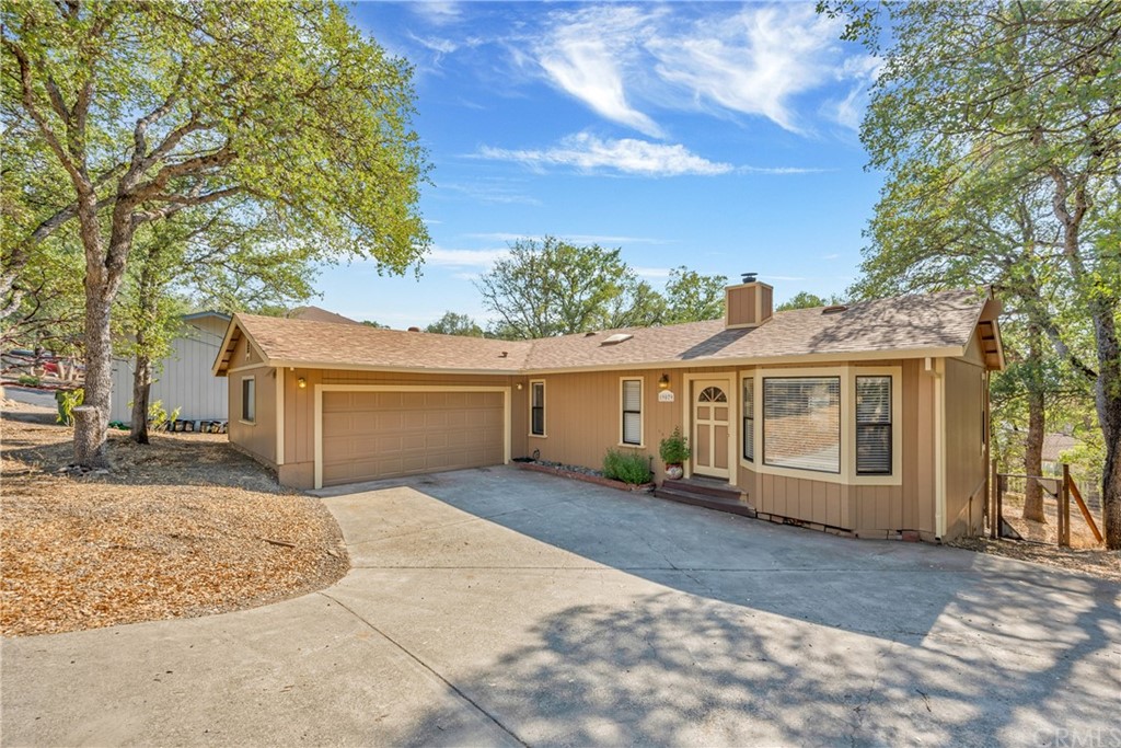 19079 Moon Ridge Road Hidden Valley Lake, CA 95467 - Photo 1 of 1 front view of a house with a yard