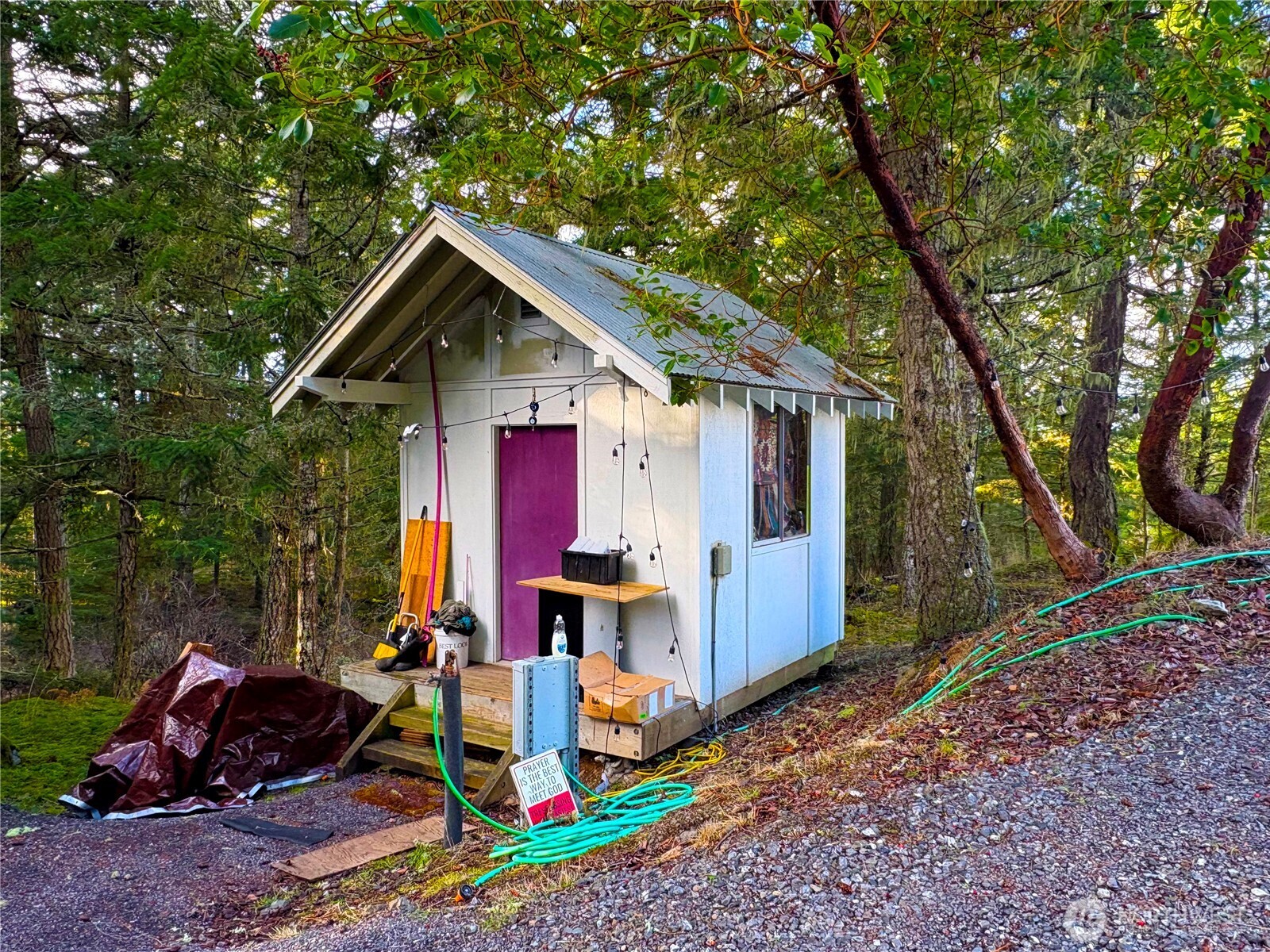 705 Mt Dallas Road Friday Harbor, WA 98250 - Photo 10 of 26 a backyard of a house with seating space