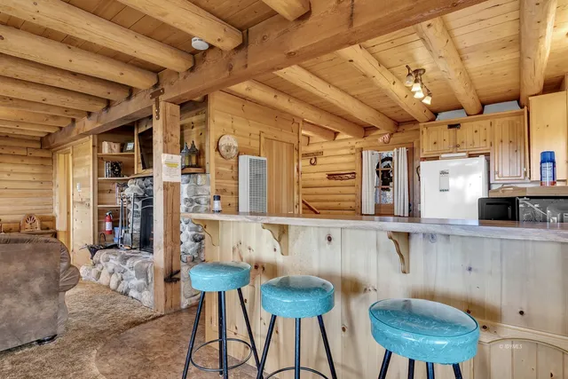 a view of a hallway with a bathroom