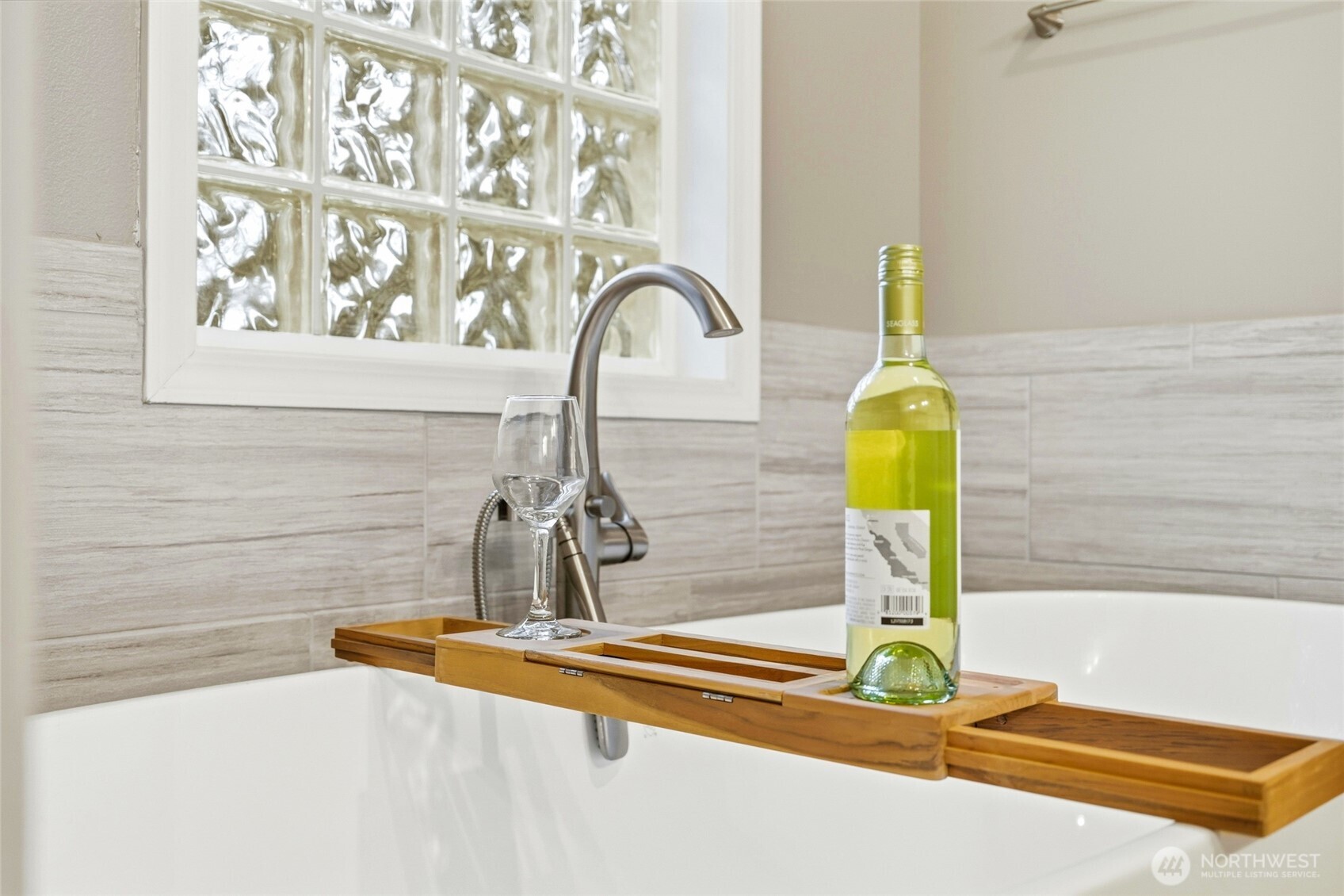 1026 McRae Road Northwest Arlington, WA 98223 - Photo 23 of 40 a bathroom with a sink and a window