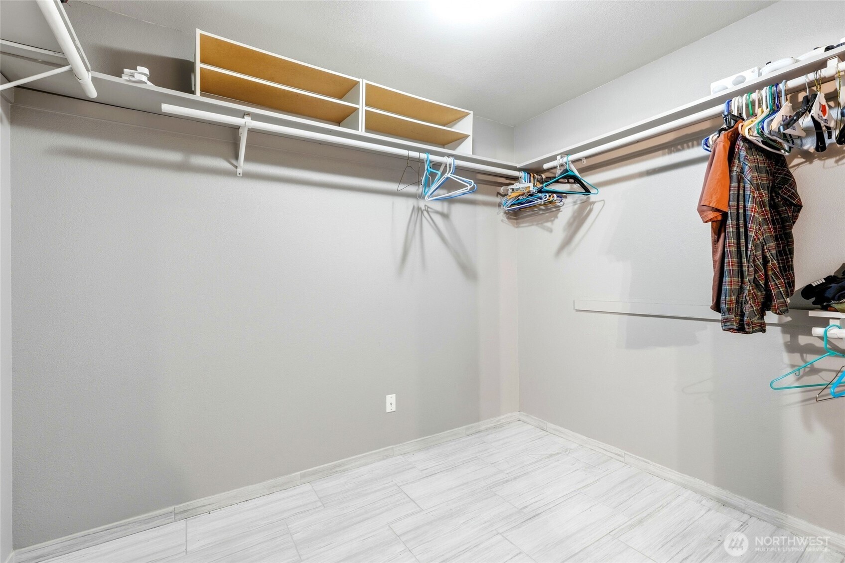 1026 McRae Road Northwest Arlington, WA 98223 - Photo 24 of 40 a view of walk in closet with clothes and shoes