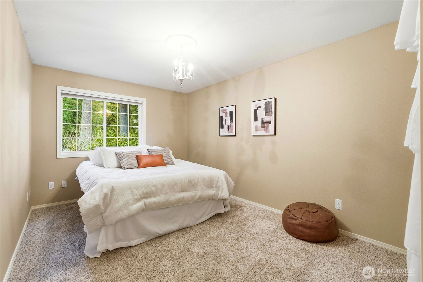 1026 McRae Road Northwest Arlington, WA 98223 - Photo 25 of 40 a bedroom with a bed and a window
