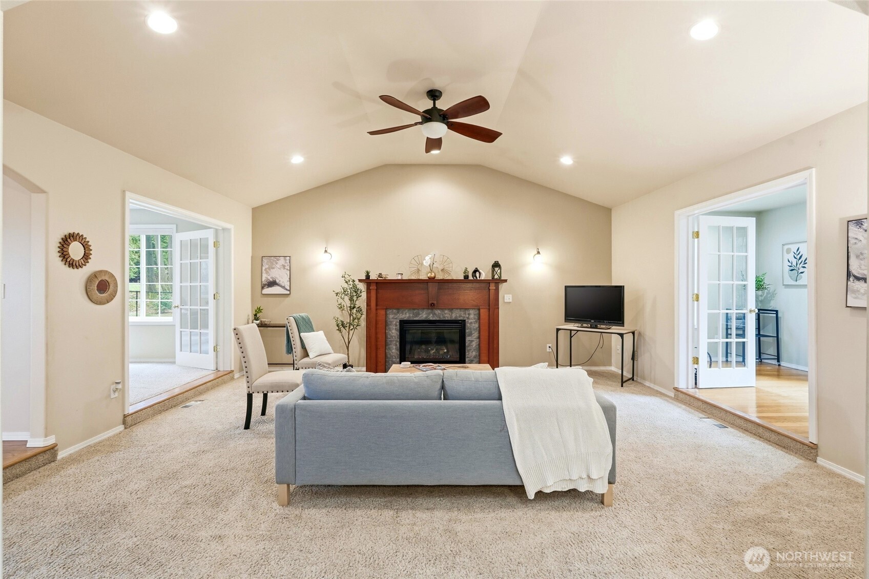 1026 McRae Road Northwest Arlington, WA 98223 - Photo 5 of 40 a living room with furniture and a fireplace