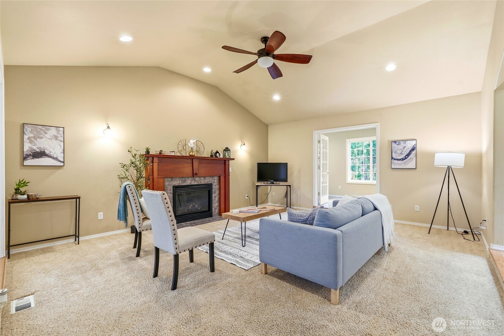 1026 McRae Road Northwest Arlington, WA 98223 - Photo 6 of 40 a living room with furniture and a fireplace