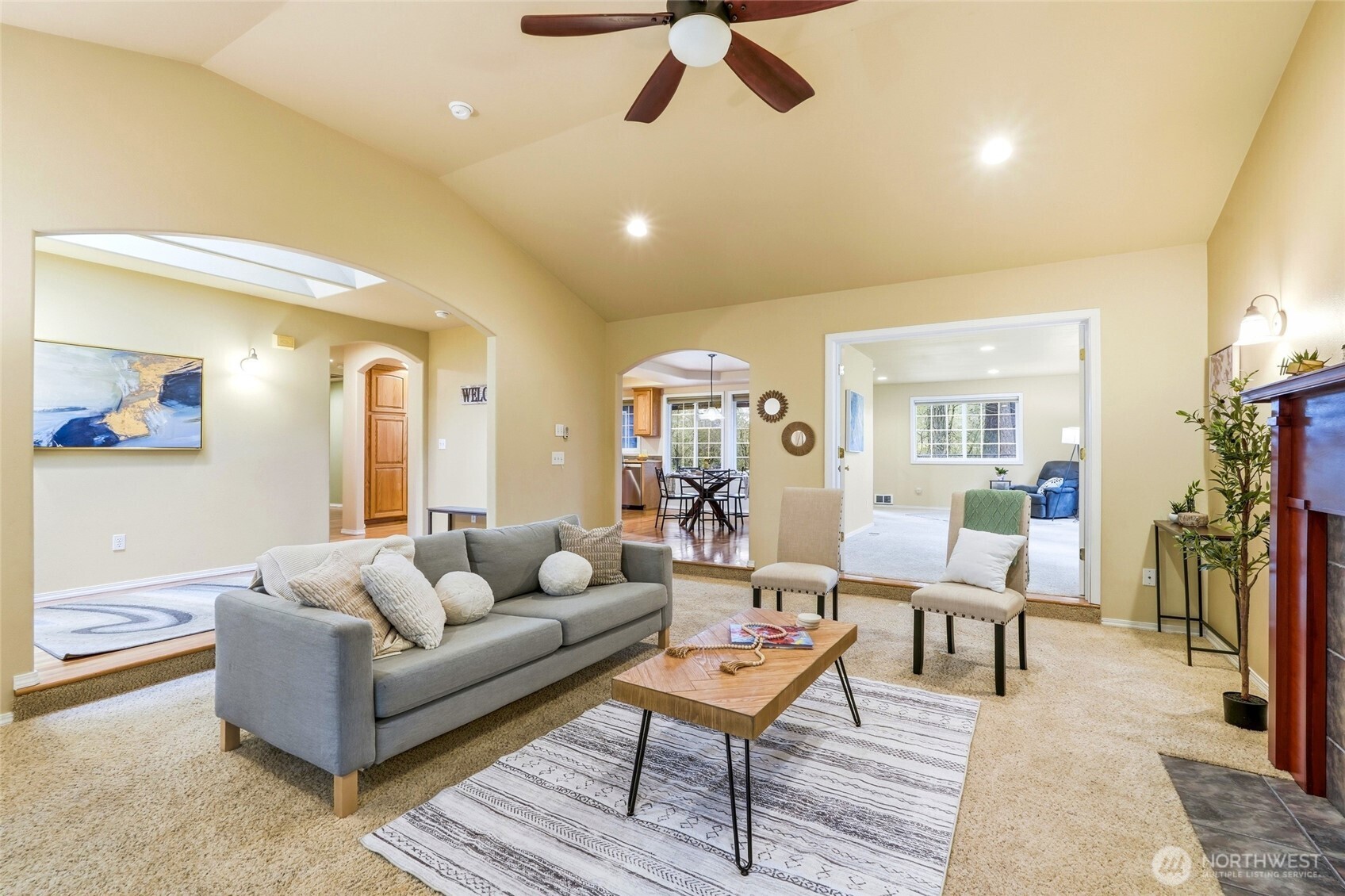 1026 McRae Road Northwest Arlington, WA 98223 - Photo 8 of 40 a living room with furniture and a wooden floor