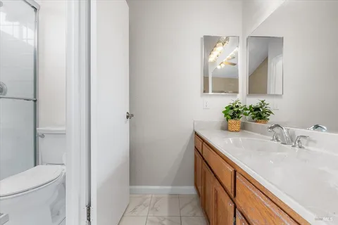 a swimming pool with outdoor seating and yard