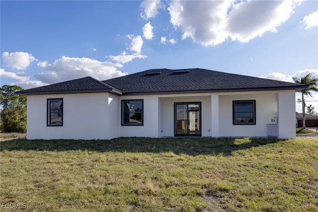 a front view of house with yard