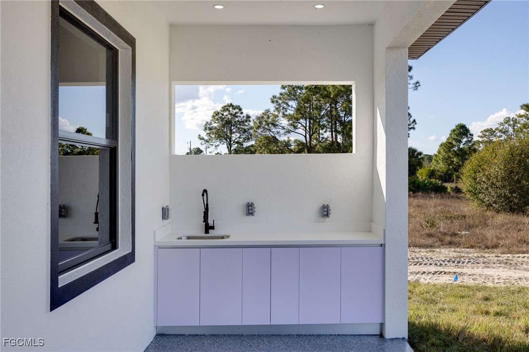2506 36th Street Southwest Lehigh Acres, FL 33976 - Photo 4 of 25 a view of a dresser