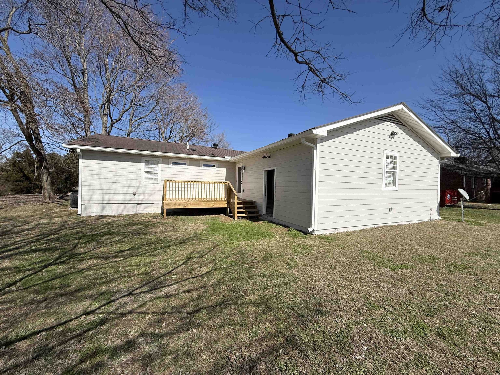 963 Highway 54 Covington, TN 38019 - Photo 3 of 26 a view of backyard of house