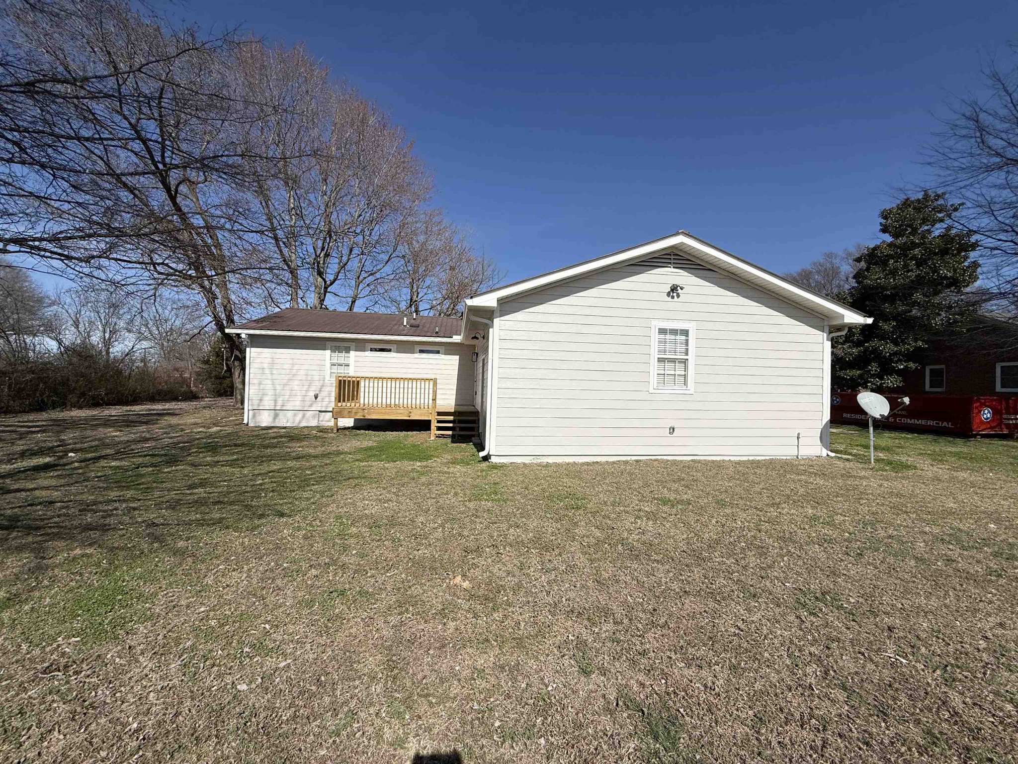 963 Highway 54 Covington, TN 38019 - Photo 4 of 26 a view of a house with a yard