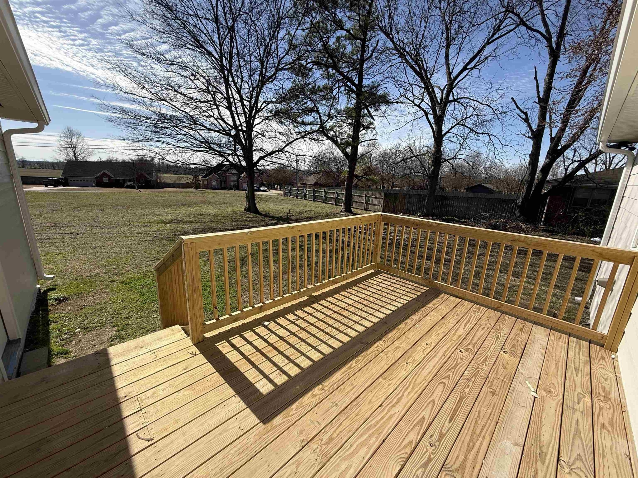 963 Highway 54 Covington, TN 38019 - Photo 5 of 26 a view of deck with wooden floor and outdoor seating