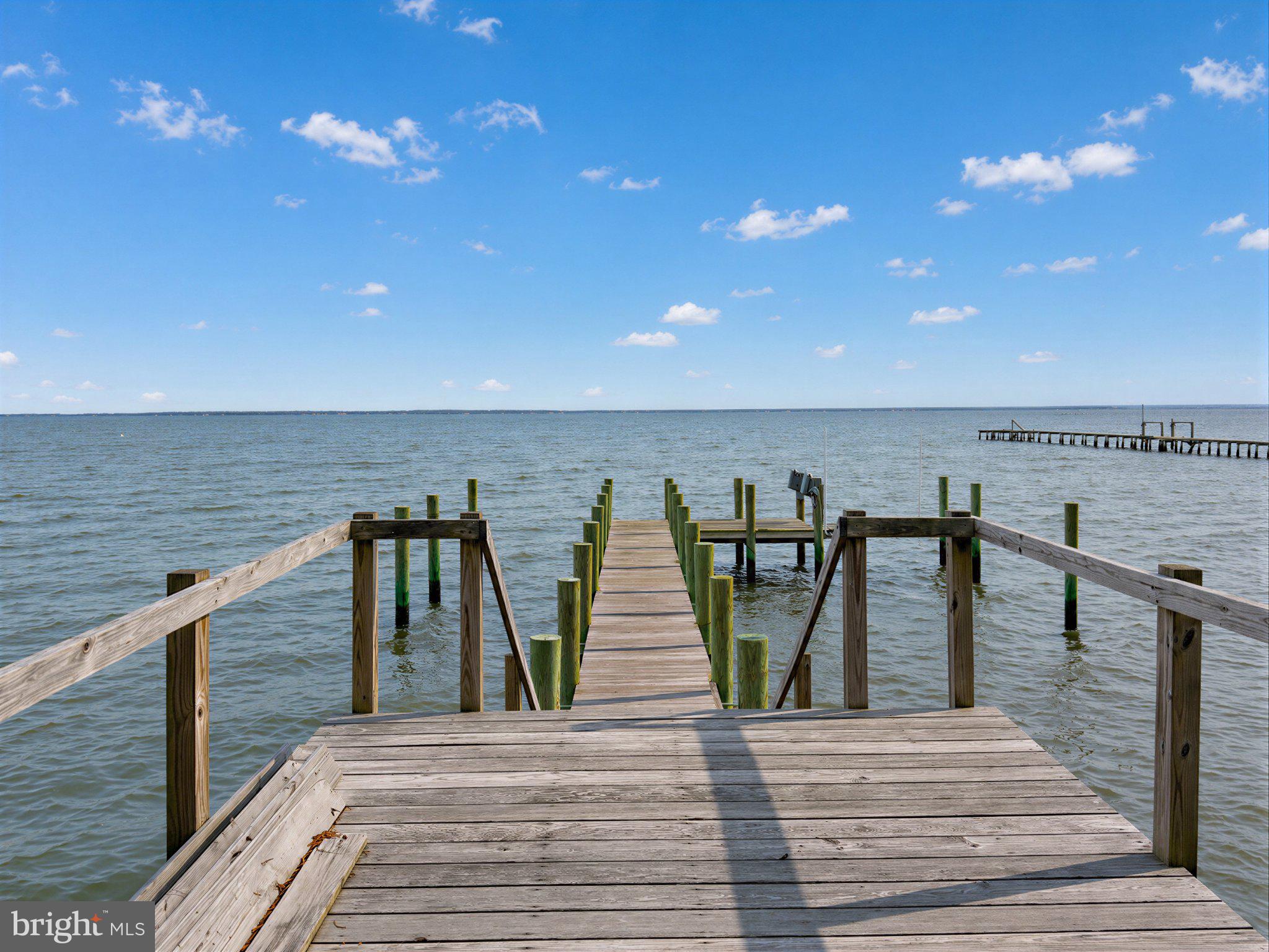 42195 White Point Beach Road Leonardtown, MD 20650 - Photo 23 of 57 Tranquil dock by serene waters.