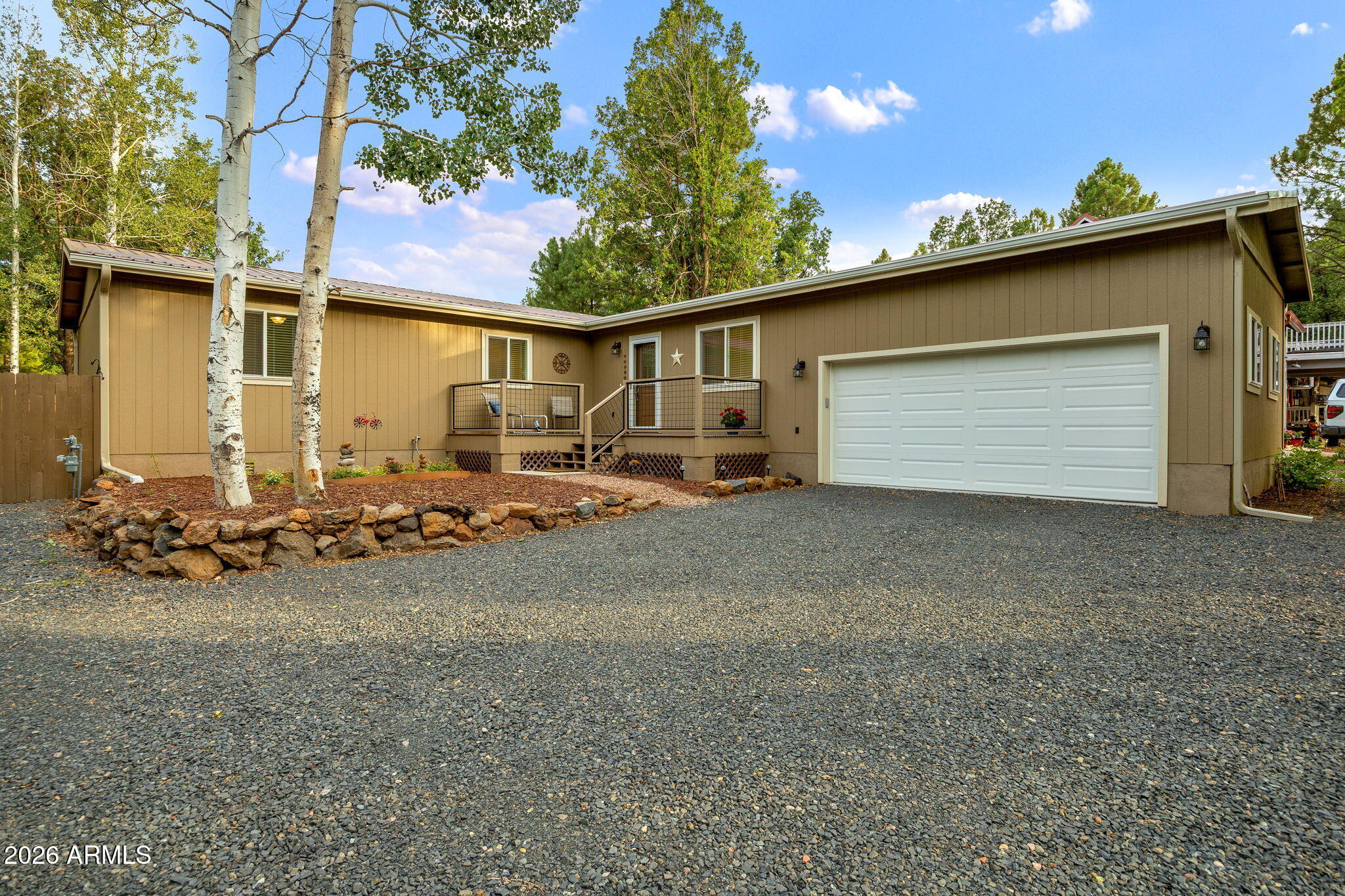 5145 Drifting Snow Loop Pinetop, AZ 85935 - Photo 37 of 37 a view of a house with a patio