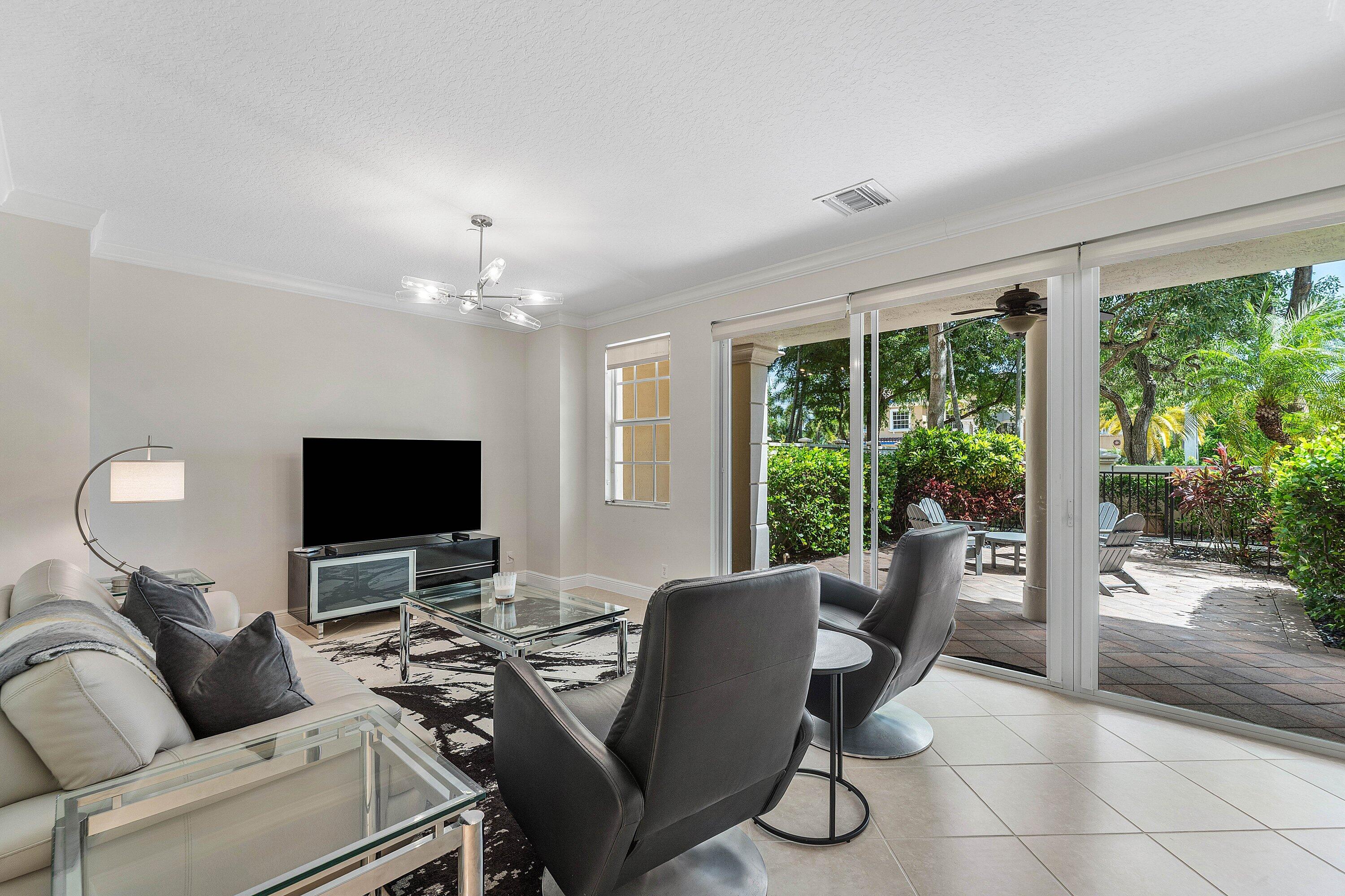 5580 Northeast Trieste Way Boca Raton, FL 33487 - Photo 7 of 87 LOWER LEVEL FAMILY ROOM