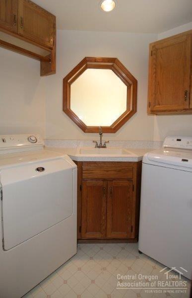 62593 Quail Ridge Road Bend, OR 97701 - Photo 11 of 25 Large laundry room with maytag washer an