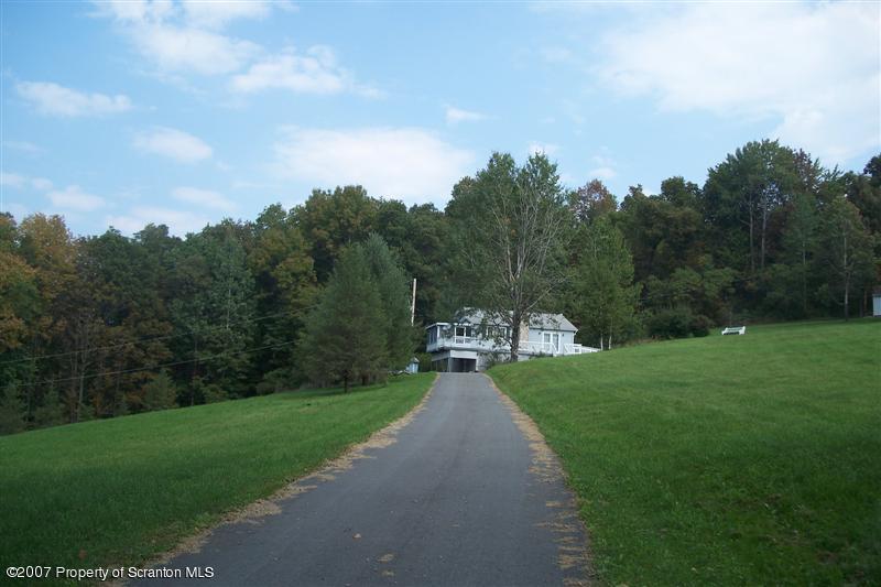 7432 Turnpike Road Montrose, PA 18801 - Photo 2 of 13 a view of a park with large trees