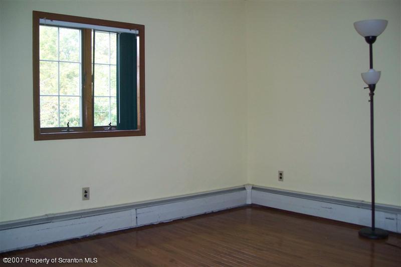 7432 Turnpike Road Montrose, PA 18801 - Photo 6 of 13 an empty room with a window