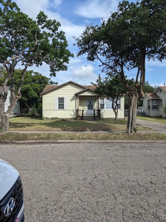 a house with trees in the background