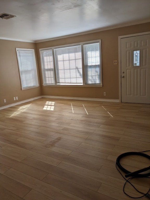 4217 Cambridge Drive Corpus Christi, TX 78415 - Photo 13 of 39 a view of an empty room with a window and wooden floor