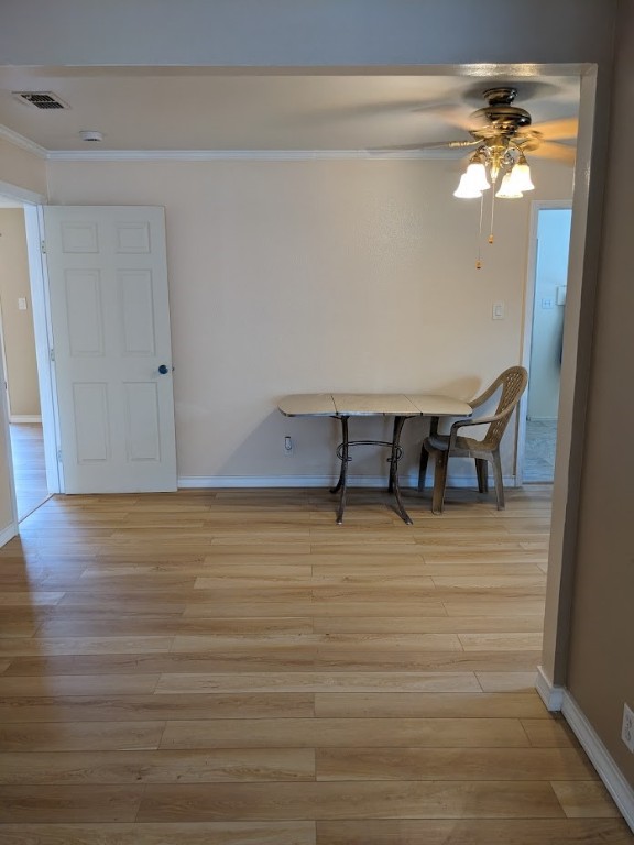 4217 Cambridge Drive Corpus Christi, TX 78415 - Photo 14 of 39 a view of a room with wooden floor and chandelier