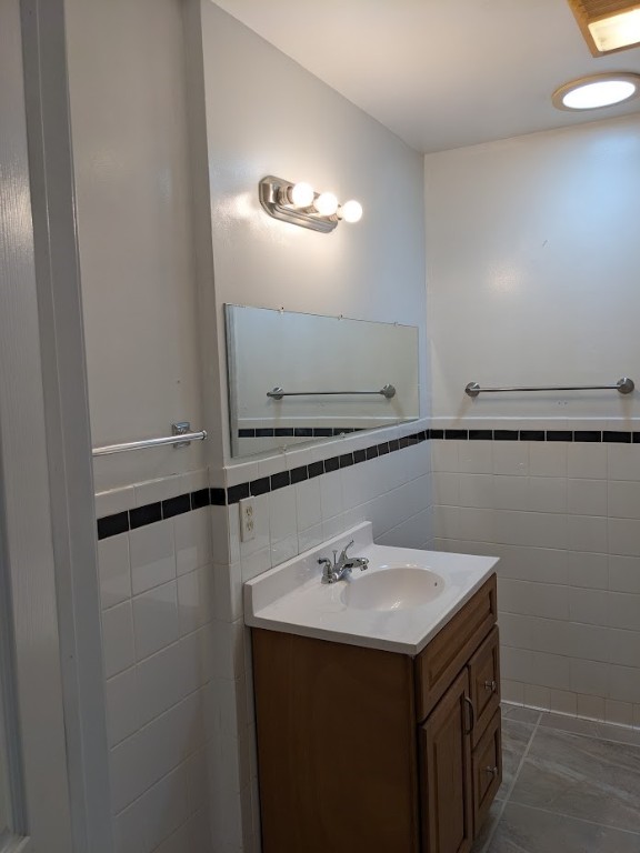 4217 Cambridge Drive Corpus Christi, TX 78415 - Photo 35 of 39 a bathroom with a sink and a mirror