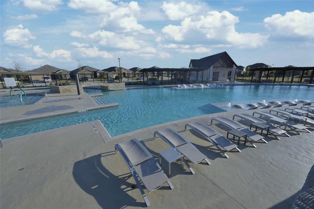 728 Rubicon Road Justin, TX 76247 - Photo 28 of 36 an aerial view of a house with outdoor space and lake view in back