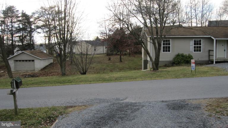 260 Truman Road Inwood, WV 25428 - Photo 5 of 20 view of detached garage to left of home