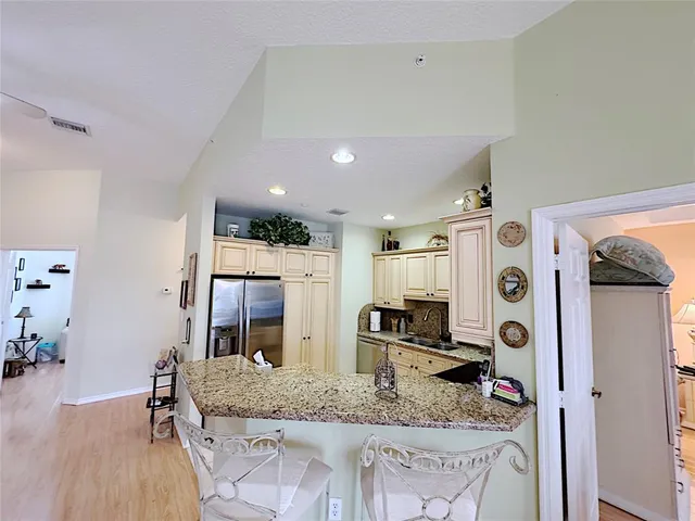 a view of living room filled with furniture and window