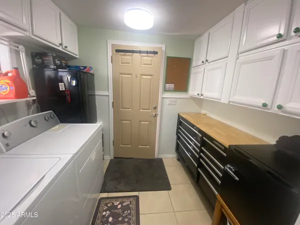 a living room with furniture a window and a fireplace