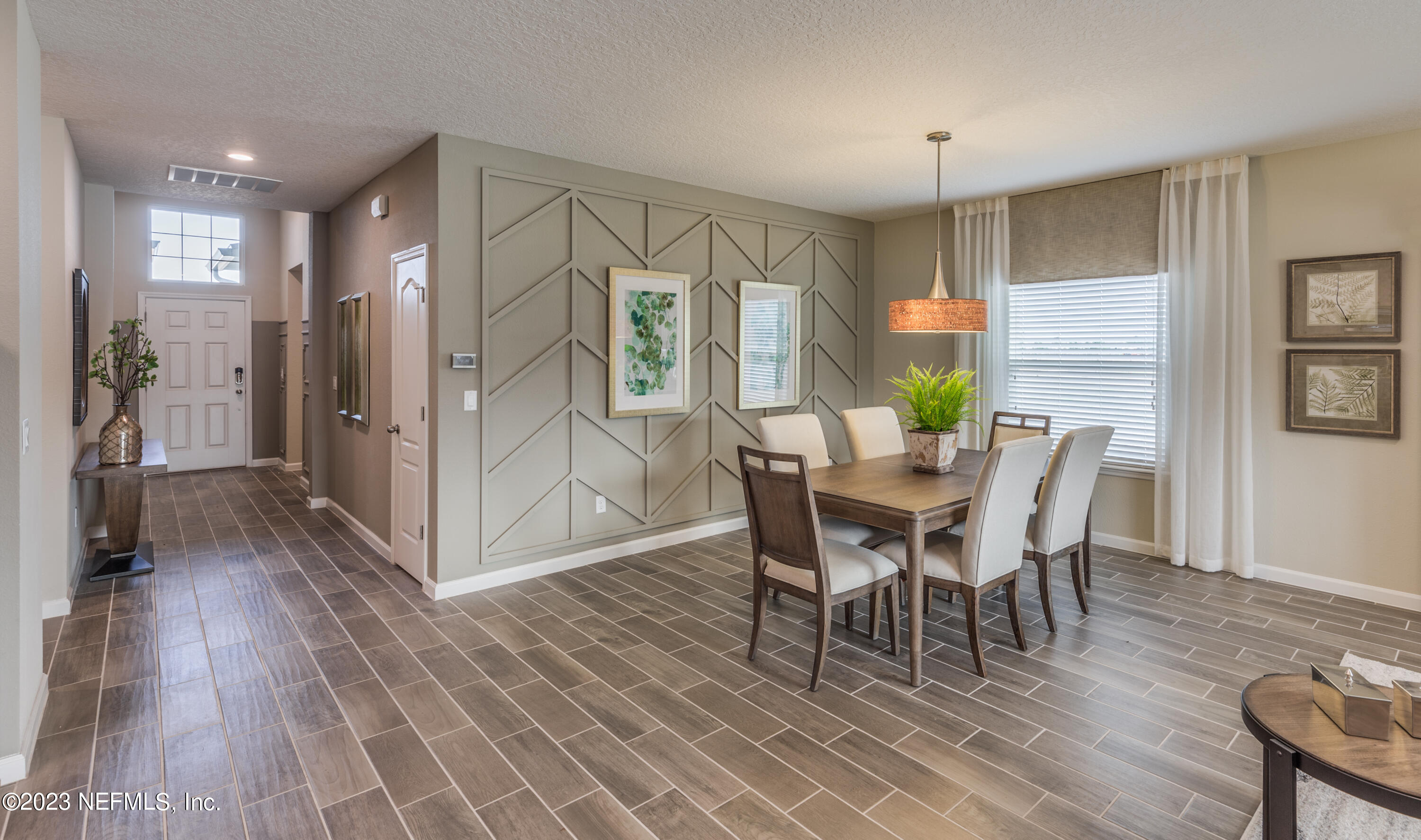 210 White Rabbit Run St. Augustine, FL 32092 - Photo 8 of 18 a dining room with furniture and wooden floor