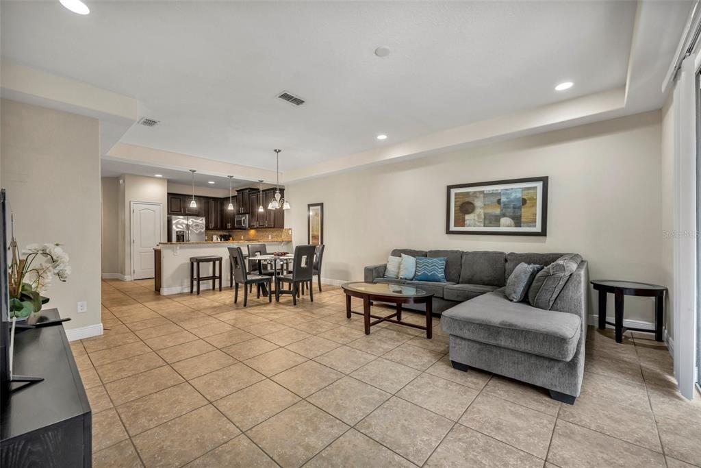 8177 Roseville Road Davenport, FL 33896 - Photo 15 of 39 a living room with furniture and wooden floor