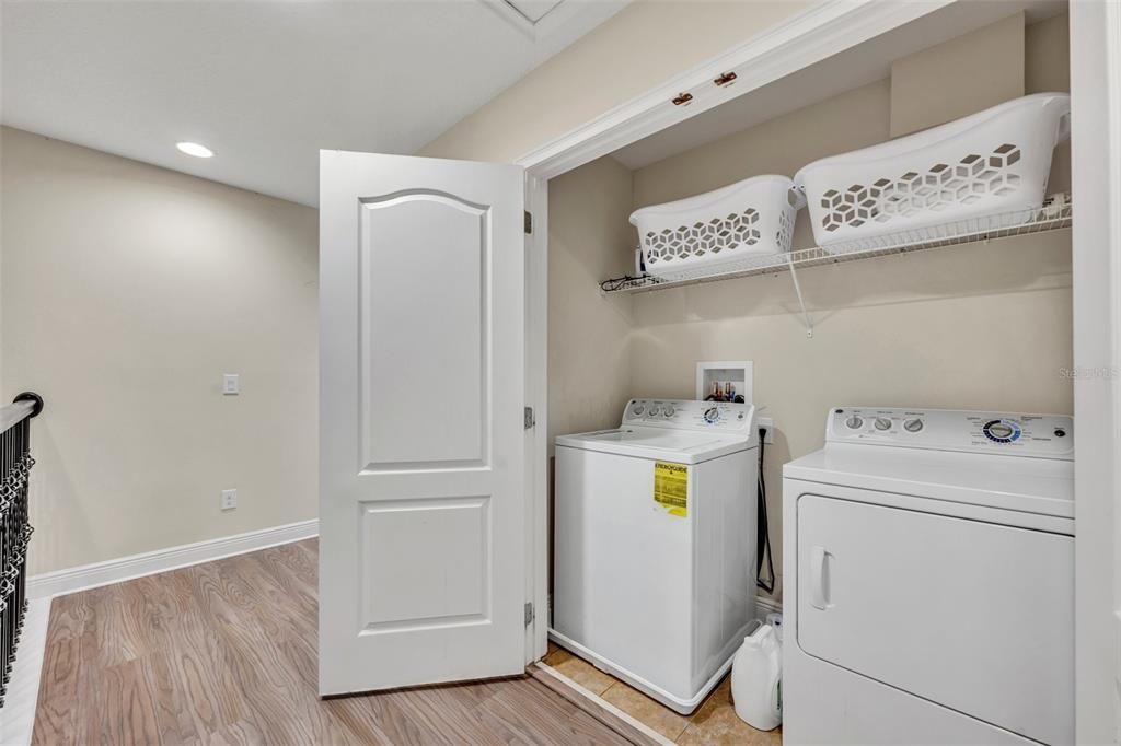 8177 Roseville Road Davenport, FL 33896 - Photo 24 of 39 a utility room with dryer and washer