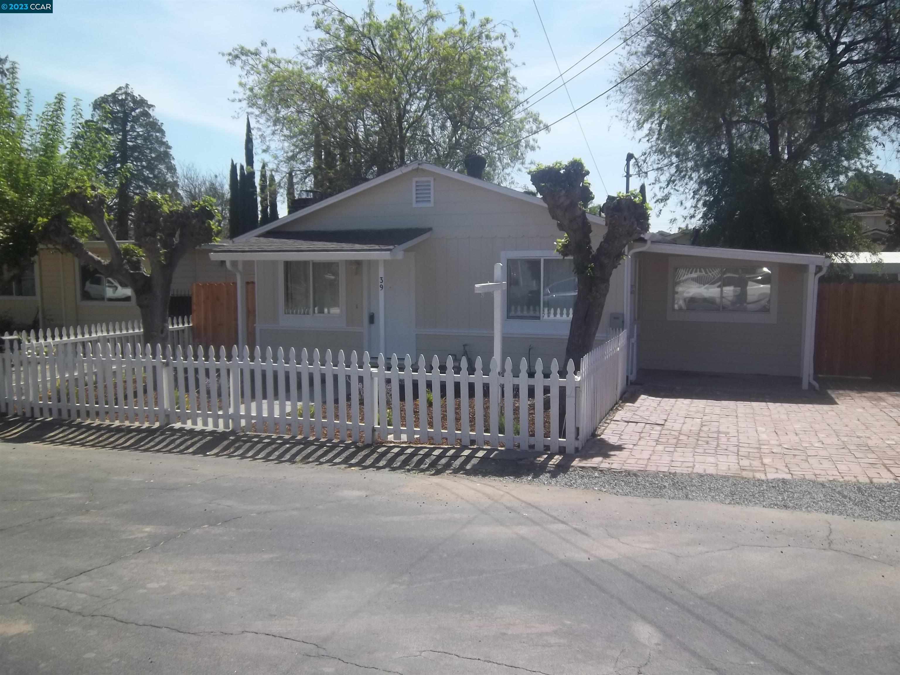 39 Adelaide Drive Martinez, CA 94553 - Photo 1 of 1 a front view of a house with a fence