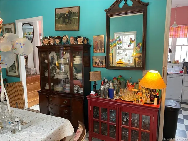 a bed room with a bed and a television