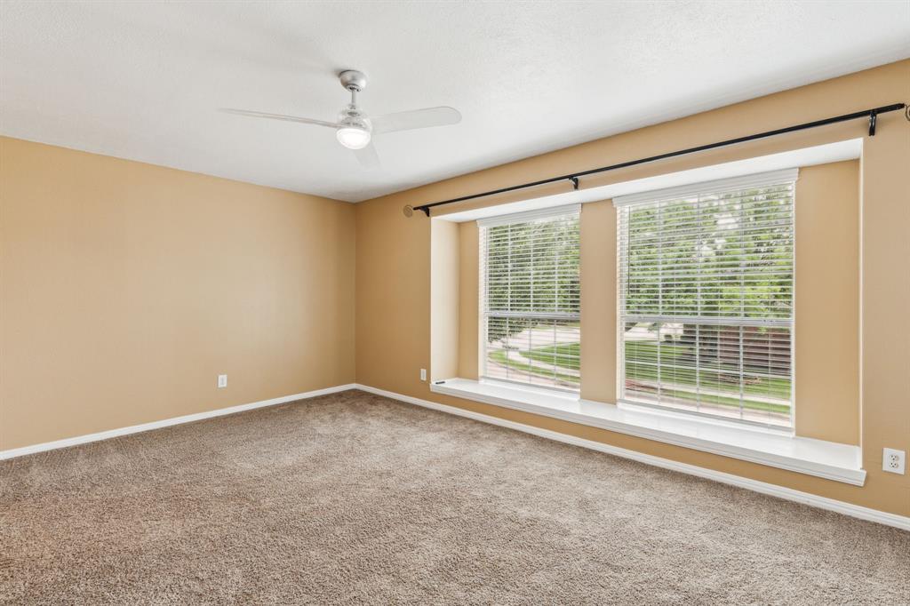 9434 Abbey Road Irving, TX 75063 - Photo 19 of 26 Spacious Guest bedroom2 with Front view & lots of natural light