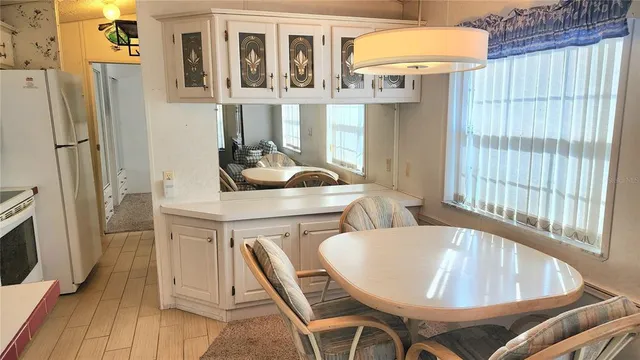 a utility room with sink washer and dryer