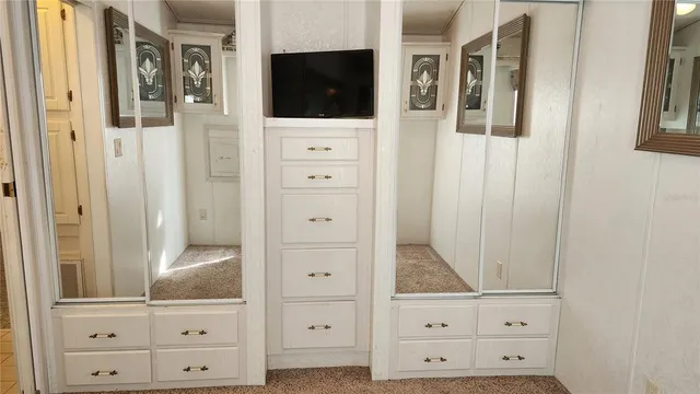 a bathroom with a bath tub and a shower