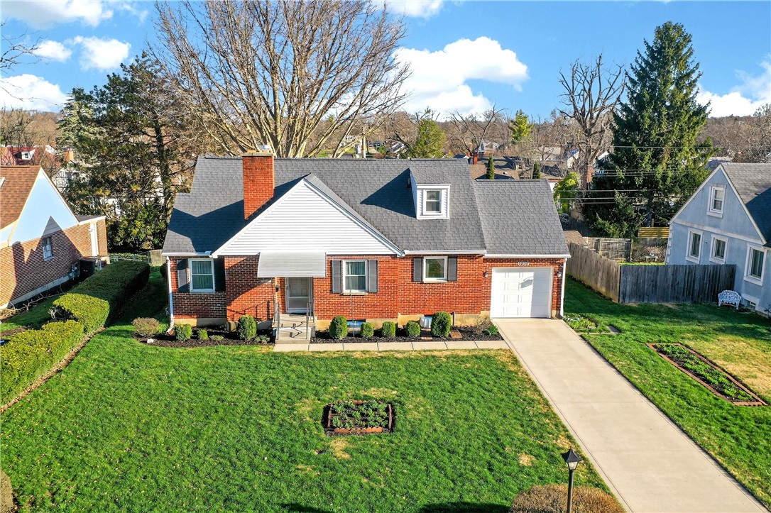 1237 Laurelwood Road Dayton, OH 45409 - Photo 44 of 56 This charming brick home offers classic appeal and a well-maintained exterior.