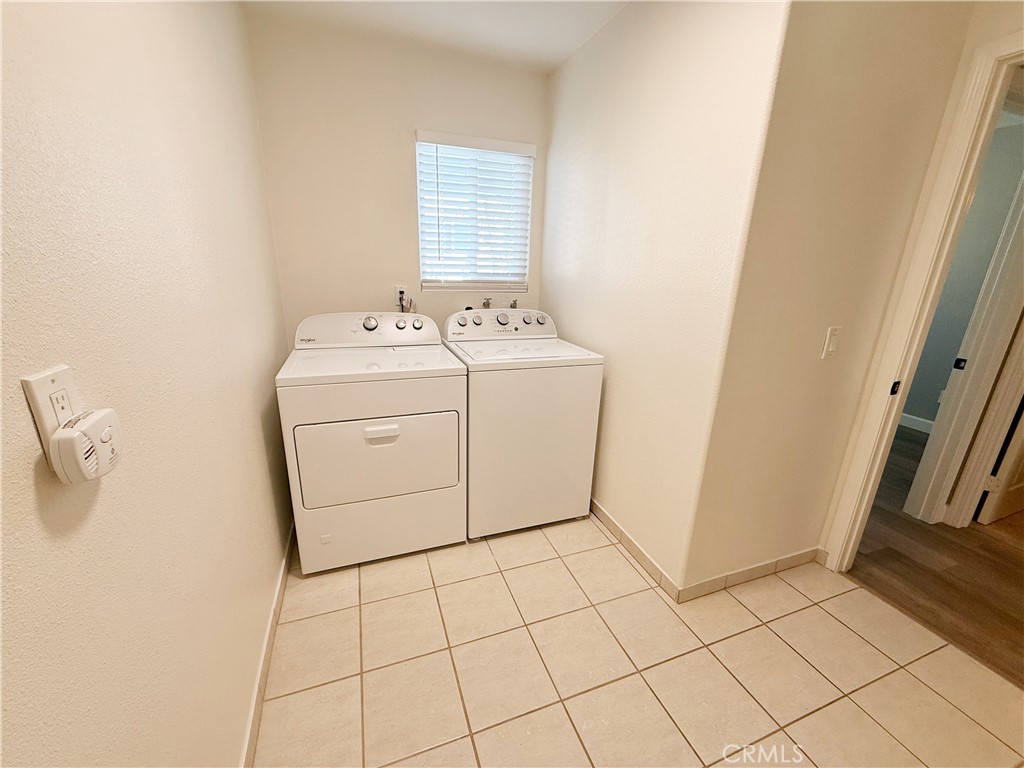 173 Oval Road, Unit 2 Irvine, CA 92604 - Photo 17 of 23 a utility room with dryer and washer