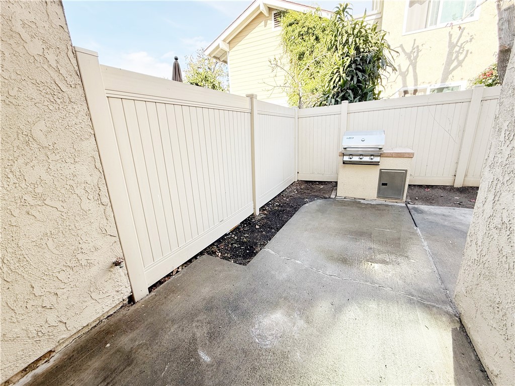 173 Oval Road, Unit 2 Irvine, CA 92604 - Photo 19 of 23 a view of a backyard with cabin
