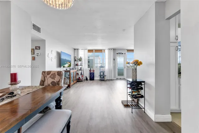 a very nice looking living room with furniture and wooden floor