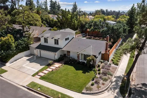 an aerial view of a house having yard