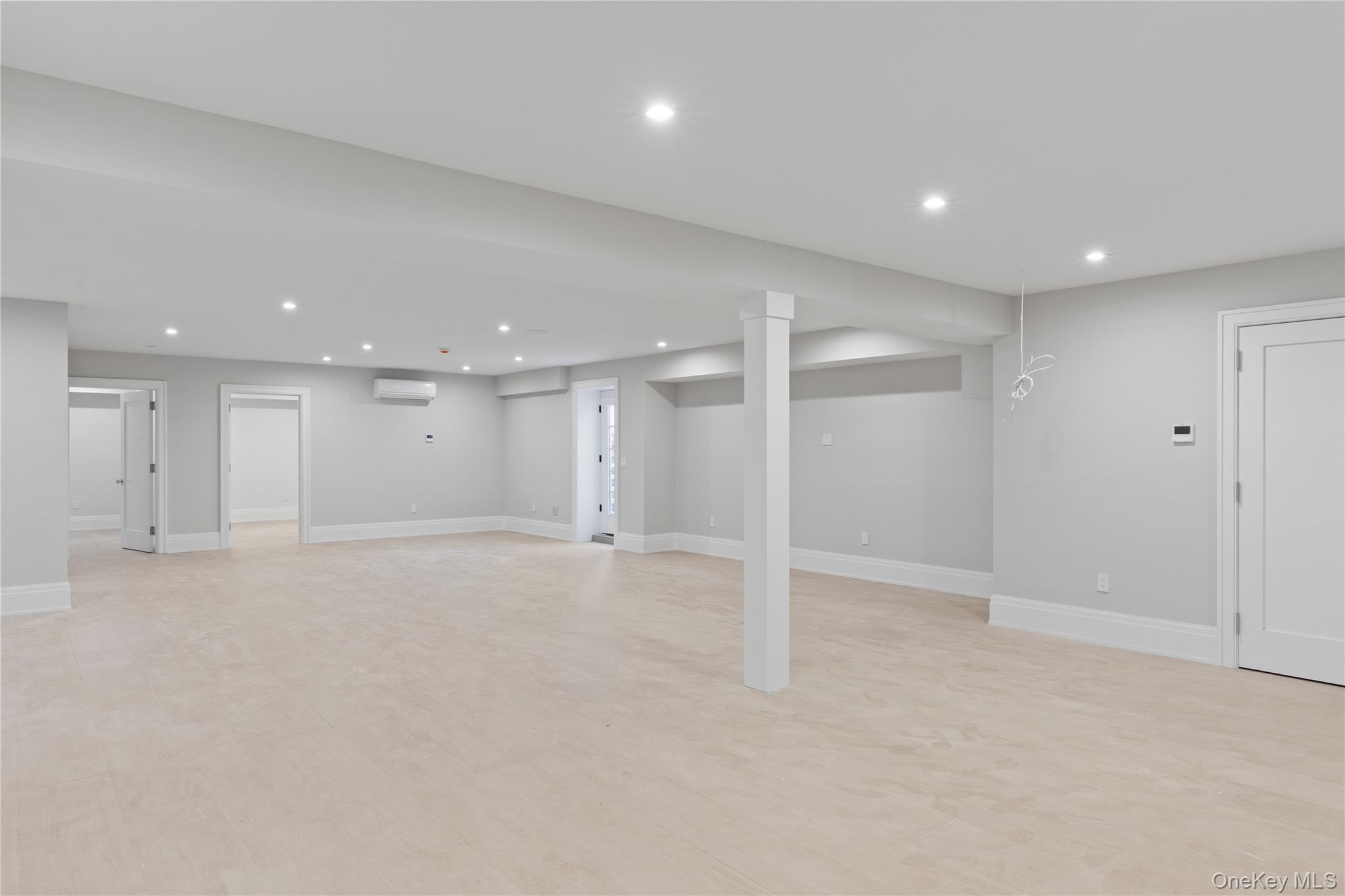 2590 Cox Neck Road Mattituck, NY 11952 - Photo 36 of 50 A full,expansive basement offering endless possibilities for recreation fitness, media or additional living space, includes a bedroom and bathroom.