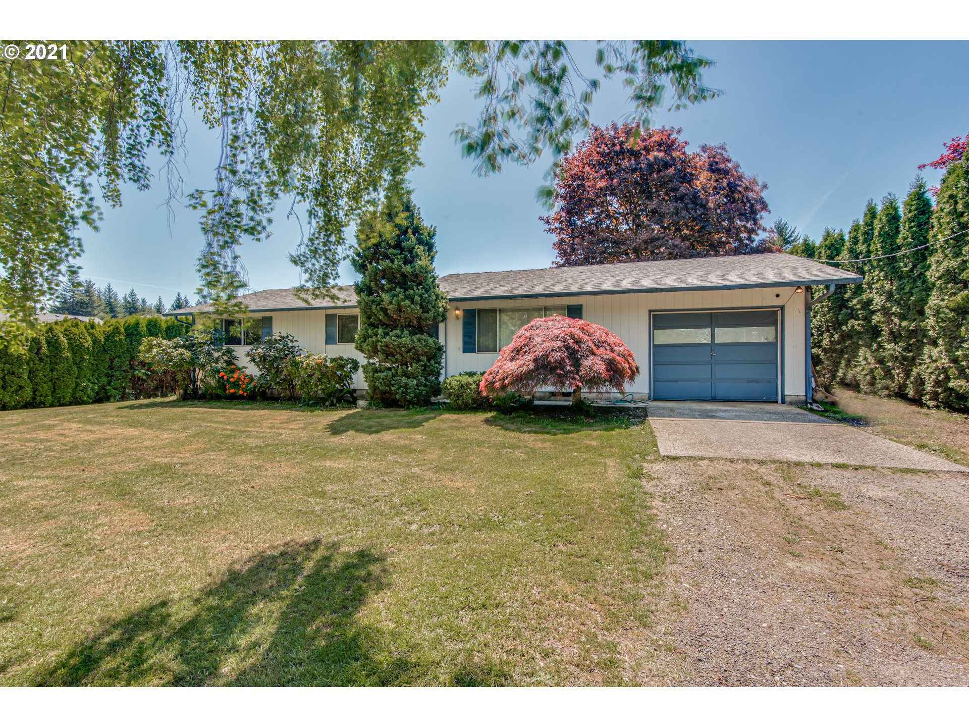 27503 Southeast 15th Street Camas, WA 98607 - Photo 1 of 12 a front view of a house with garden