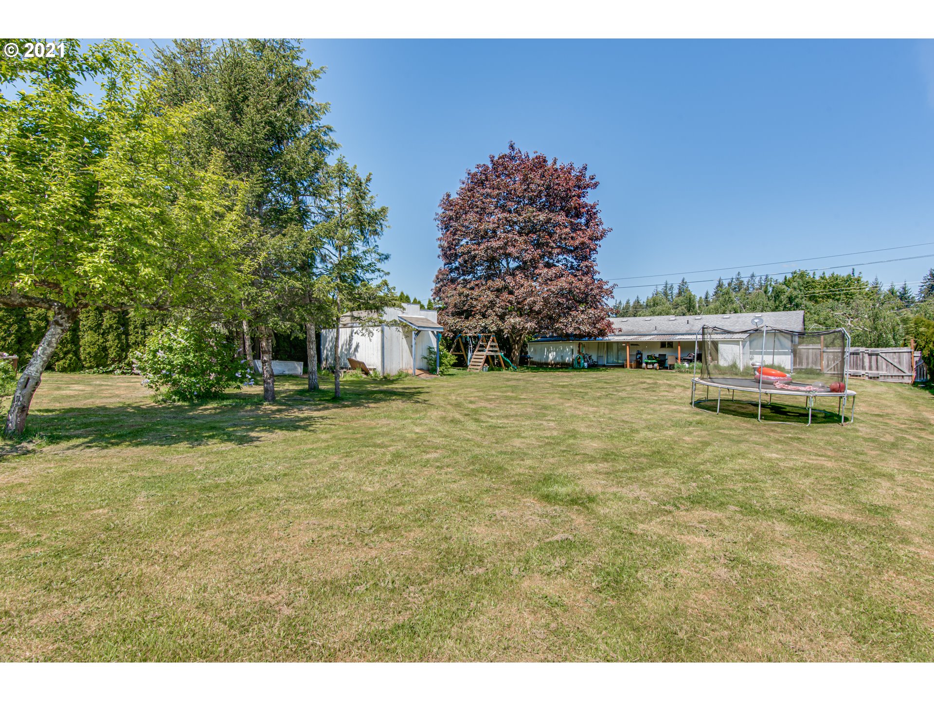 27503 Southeast 15th Street Camas, WA 98607 - Photo 5 of 12 a view of a chairs and table in the garden