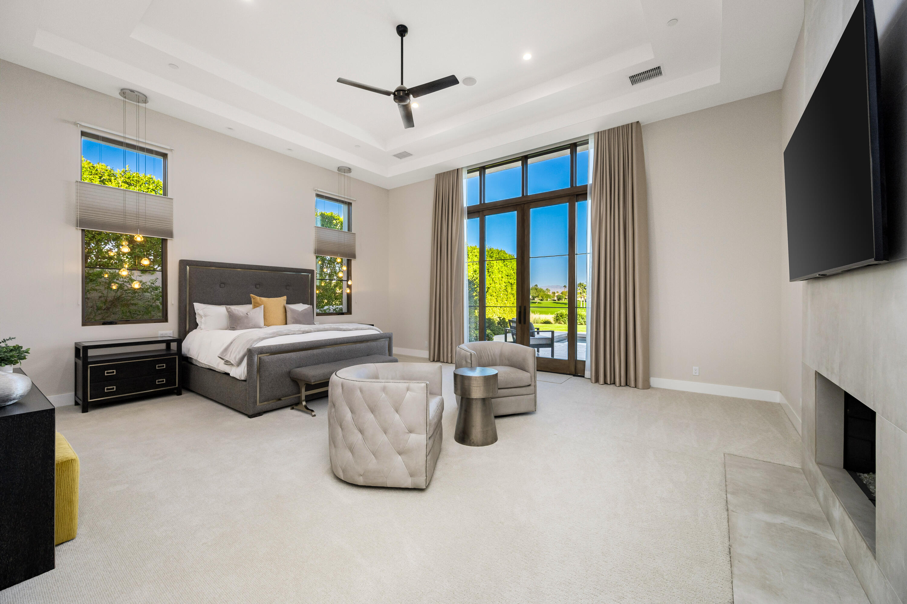 53488 Via Strada La Quinta, CA 92253 - Photo 19 of 56 a bedroom with bed and a flat screen tv